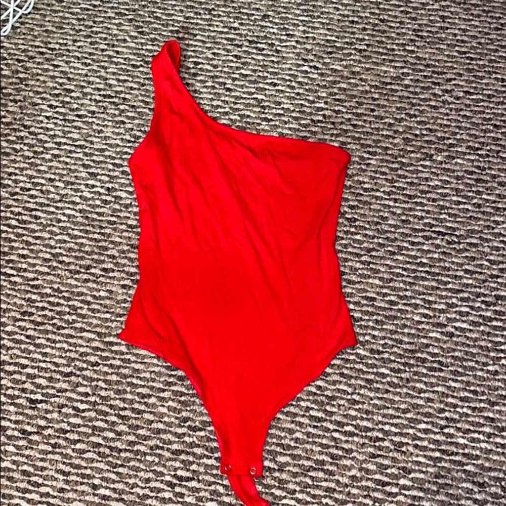 Red one shoulder body suit